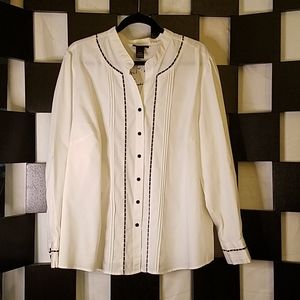 White button down shirt with black trim